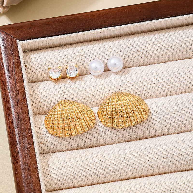 SILUEEN™ - Orecchini in conchiglia dorata