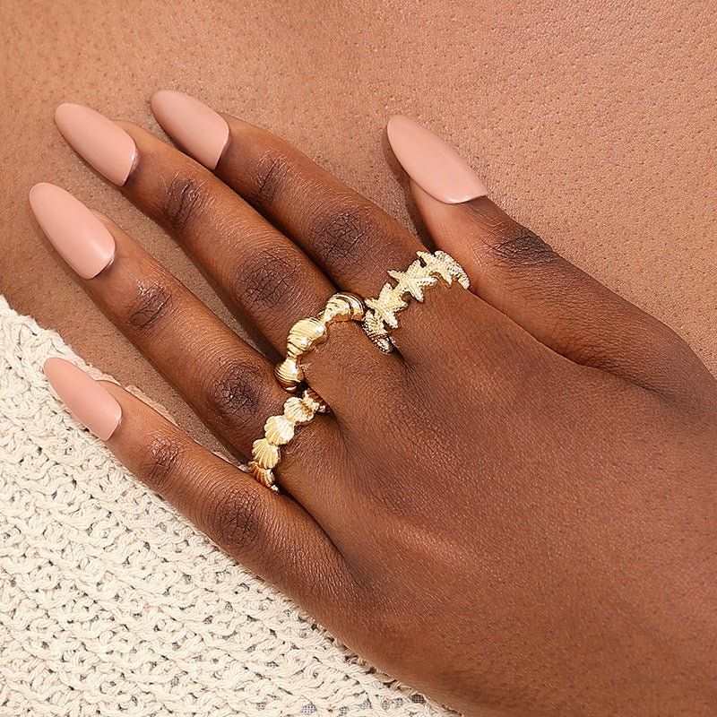 SILUEEN™- Set de Anillos Dorados “Olas del Mar”