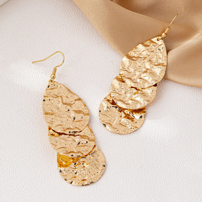 SILUEEN™ - Orecchini a onde dorate 